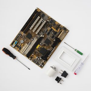 top-view-circuit-board-electrical-equipment-white-surface